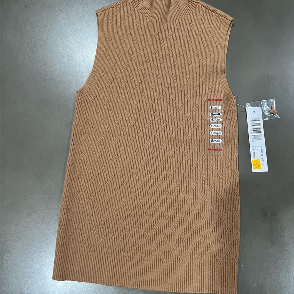 Sleeveless mock neck.  Size small. Cinnamon color.  Brand- Tribal